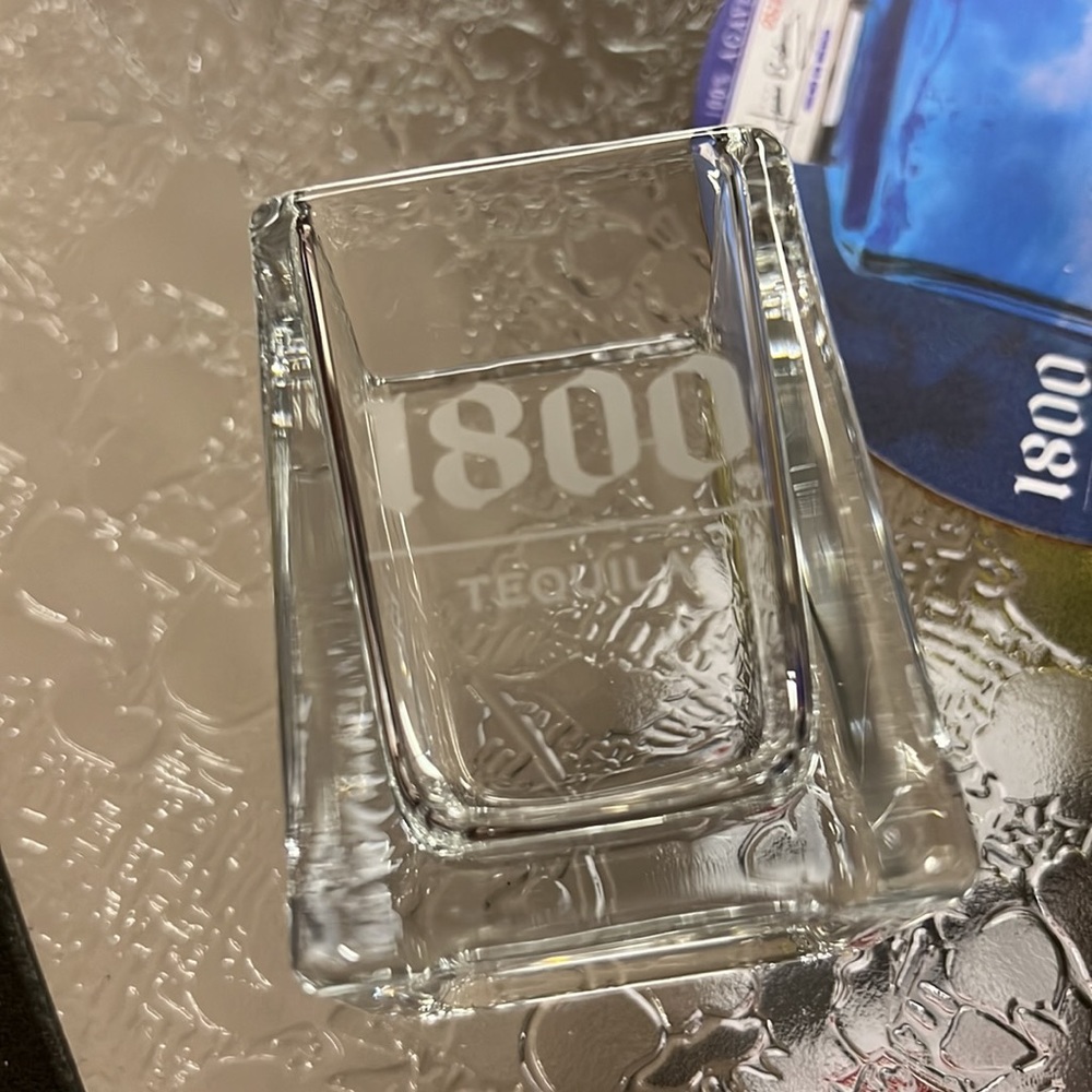 New 1800 tequila square shot glass and one Coaster